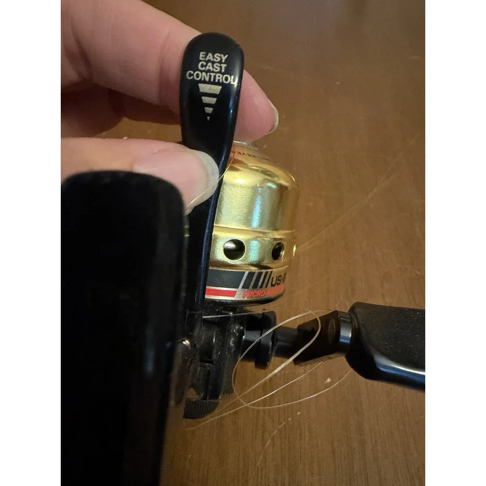 Vintage Daiwa US-80XA Spincast Fishing Reel - Gold & Black Micro Adjustable Drag